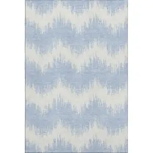 Photo of Sky Blue And Ivory Chevron Washable Area Rug With UV Protection