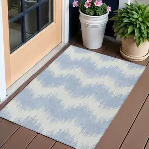 Photo of Sky Blue And Ivory Chevron Washable Indoor Outdoor Area Rug
