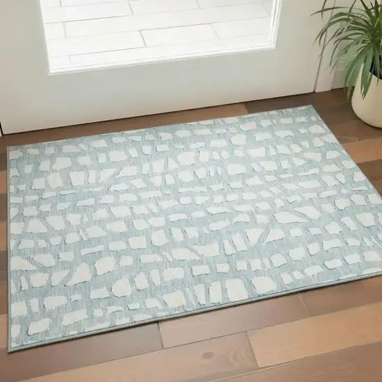 Sky Blue And Ivory Cobblestone Washable Area Rug With UV Protection Photo 1