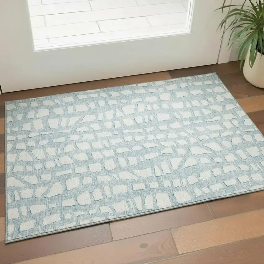 Sky Blue And Ivory Cobblestone Washable Area Rug With UV Protection Photo 1