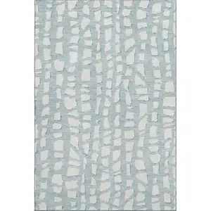 Photo of Sky Blue And Ivory Cobblestone Washable Area Rug With UV Protection