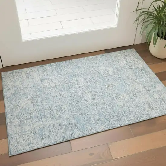 Sky Blue And Ivory Floral Washable Area Rug With UV Protection Photo 1
