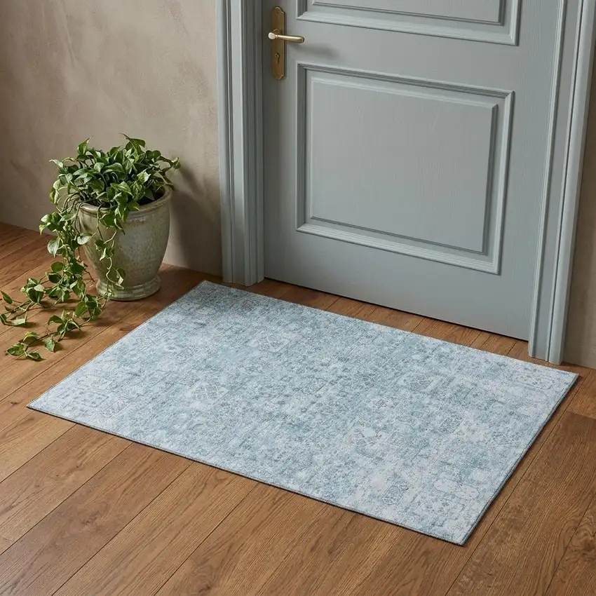 Sky Blue And Ivory Floral Washable Area Rug With UV Protection Photo 1
