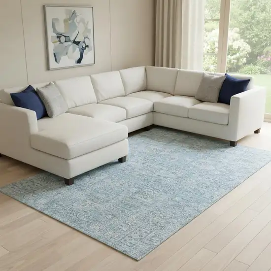 Sky Blue And Ivory Floral Washable Area Rug With UV Protection Photo 1