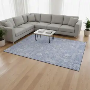Photo of Sky Blue And Ivory Floral Washable Area Rug With UV Protection