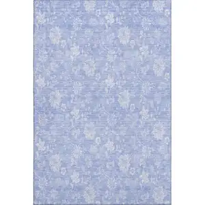 Photo of Sky Blue And Ivory Floral Washable Area Rug With UV Protection