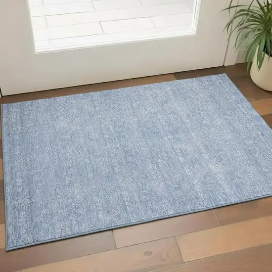 Sky Blue And Ivory Floral Washable Area Rug With UV Protection Photo 1
