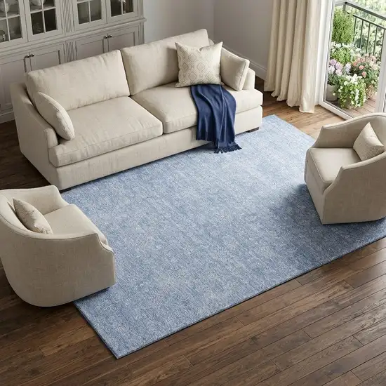Sky Blue And Ivory Floral Washable Area Rug With UV Protection Photo 1