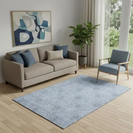 Sky Blue And Ivory Floral Washable Area Rug With UV Protection Photo 1