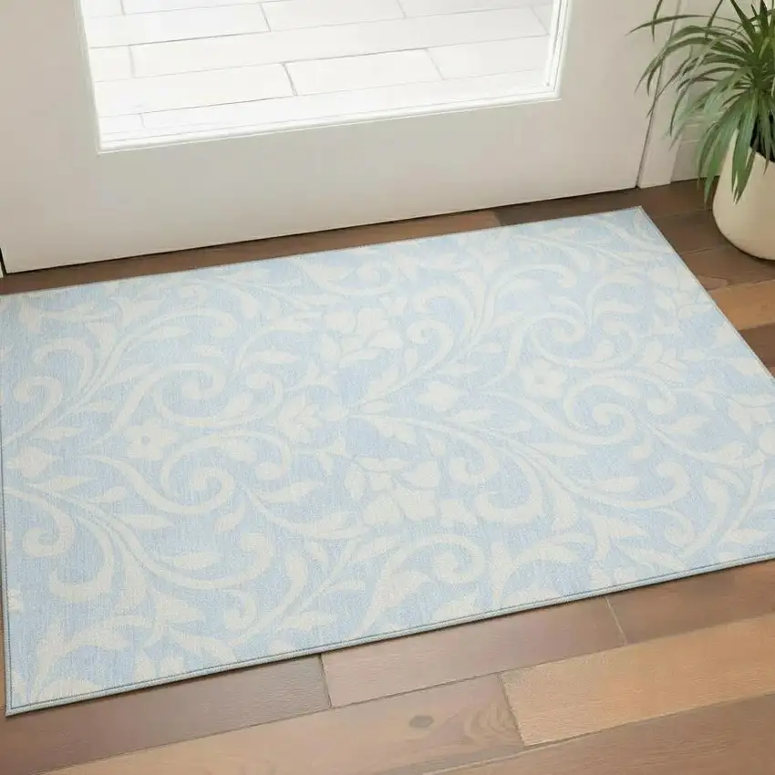 Sky Blue And Ivory Floral Washable Area Rug With UV Protection Photo 1