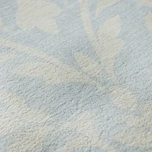 Photo of Sky Blue And Ivory Floral Washable Area Rug With UV Protection