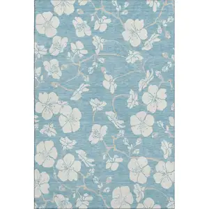 Photo of Sky Blue And Ivory Floral Washable Area Rug With UV Protection