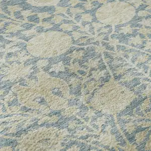 Photo of Sky Blue And Ivory Floral Washable Area Rug With UV Protection