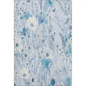 Photo of Sky Blue And Ivory Floral Washable Area Rug With UV Protection