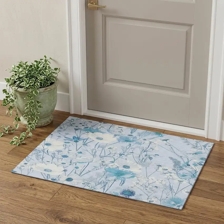 Sky Blue And Ivory Floral Washable Area Rug With UV Protection Photo 1