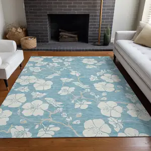 Photo of Sky Blue And Ivory Floral Washable Indoor Outdoor Area Rug