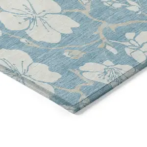 Photo of Sky Blue And Ivory Floral Washable Indoor Outdoor Area Rug