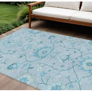 Photo of Sky Blue And Ivory Floral Washable Indoor Outdoor Area Rug