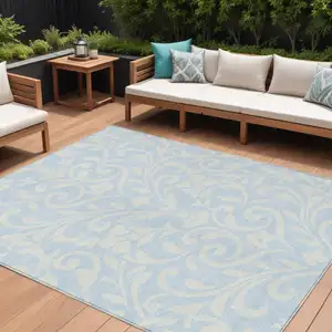Photo of Sky Blue And Ivory Floral Washable Indoor Outdoor Area Rug