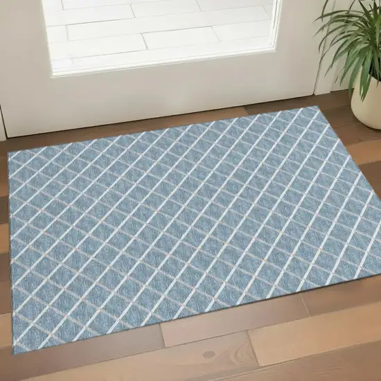 Sky Blue And Ivory Geometric Washable Area Rug With UV Protection Photo 1