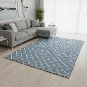 Photo of Sky Blue And Ivory Geometric Washable Area Rug With UV Protection