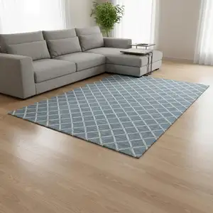 Photo of Sky Blue And Ivory Geometric Washable Area Rug With UV Protection