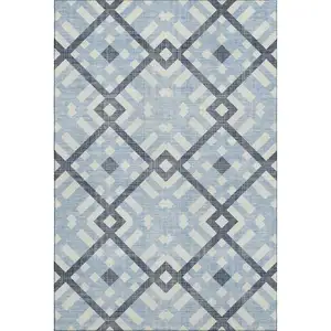 Photo of Sky Blue And Ivory Geometric Washable Area Rug With UV Protection