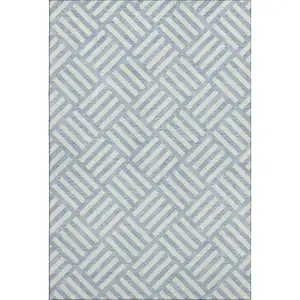 Photo of Sky Blue And Ivory Geometric Washable Area Rug With UV Protection