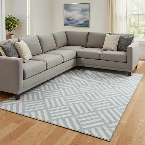 Sky Blue And Ivory Geometric Washable Area Rug With UV Protection Photo 1