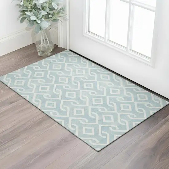 Sky Blue And Ivory Geometric Washable Area Rug With UV Protection Photo 1