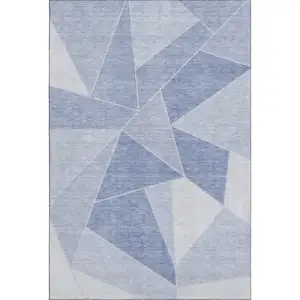 Photo of Sky Blue And Ivory Geometric Washable Area Rug With UV Protection