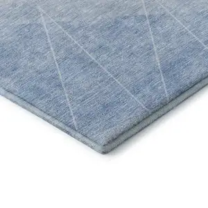 Photo of Sky Blue And Ivory Geometric Washable Area Rug With UV Protection