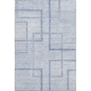 Photo of Sky Blue And Ivory Geometric Washable Area Rug With UV Protection
