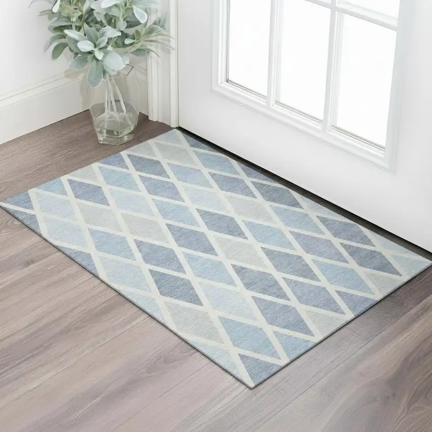 Sky Blue And Ivory Geometric Washable Area Rug With UV Protection Photo 1