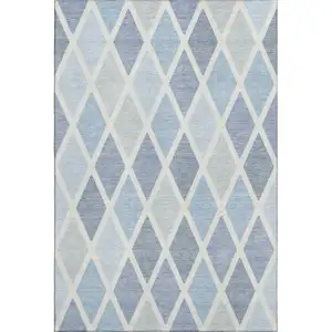 Photo of Sky Blue And Ivory Geometric Washable Area Rug With UV Protection