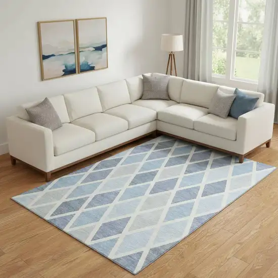 Sky Blue And Ivory Geometric Washable Area Rug With UV Protection Photo 1