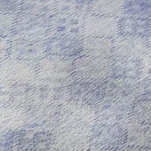 Photo of Sky Blue And Ivory Geometric Washable Area Rug With UV Protection