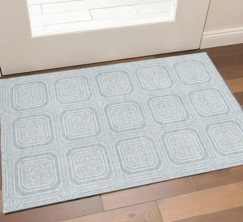 Sky Blue And Ivory Geometric Washable Area Rug With UV Protection Photo 1