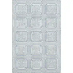 Photo of Sky Blue And Ivory Geometric Washable Area Rug With UV Protection