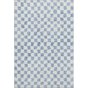 Photo of Sky Blue And Ivory Geometric Washable Area Rug With UV Protection
