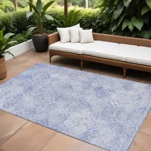 Photo of Sky Blue And Ivory Geometric Washable Indoor Outdoor Area Rug