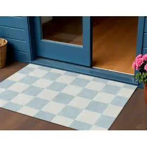Photo of Sky Blue And Ivory Geometric Washable Indoor Outdoor Area Rug