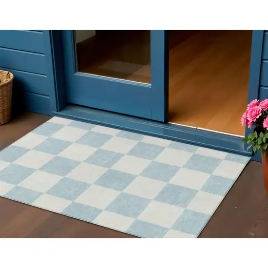 Sky Blue And Ivory Geometric Washable Indoor Outdoor Area Rug Photo 1
