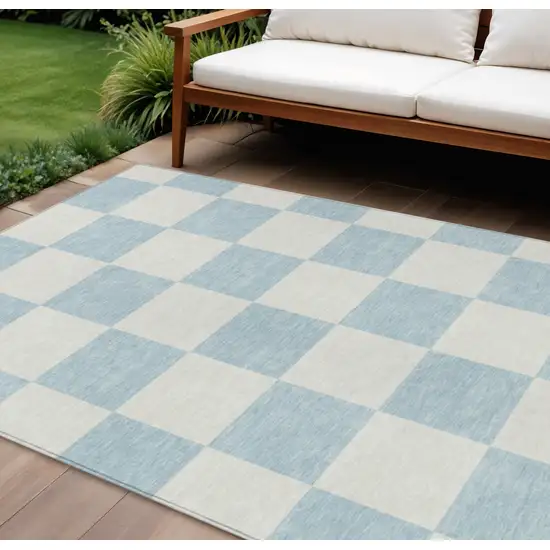 Sky Blue And Ivory Geometric Washable Indoor Outdoor Area Rug Photo 1