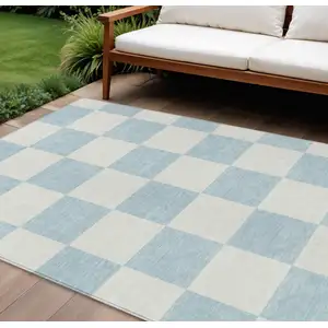 Photo of Sky Blue And Ivory Geometric Washable Indoor Outdoor Area Rug
