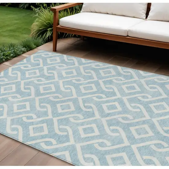Sky Blue And Ivory Geometric Washable Indoor Outdoor Area Rug Photo 1