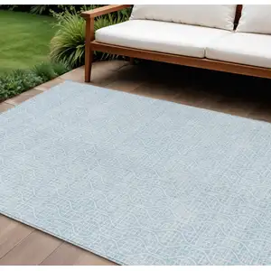 Photo of Sky Blue And Ivory Geometric Washable Indoor Outdoor Area Rug