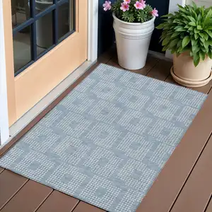 Photo of Sky Blue And Ivory Geometric Washable Indoor Outdoor Area Rug