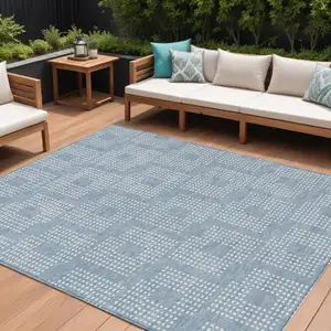 Photo of Sky Blue And Ivory Geometric Washable Indoor Outdoor Area Rug
