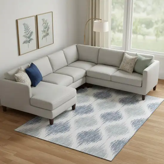 Sky Blue And Ivory Ikat Washable Area Rug With UV Protection Photo 1